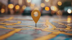 a compass resting on a map highlighting local streets and landmarks.