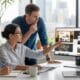 Professionals reviewing website style options for local contractors in a modern office