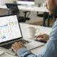 Digital marketer reviewing SEO data and keywords on a laptop