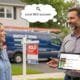 Local contractor talking with homeowners — illustrating the power of local SEO