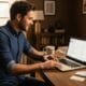 Small business owner setting up Google Ads on a laptop in a cozy office