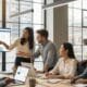 Diverse professionals collaborating in a modern office, emphasizing teamwork in digital marketing and SEO