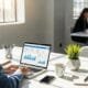 Worker using a laptop in a bright workspace &mdash; a visual for practical, modern SEO strategies