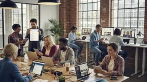 Team of contractors engaging on social media in a modern workspace