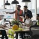 Team of contractors and marketers collaborating on content optimization in a modern workspace